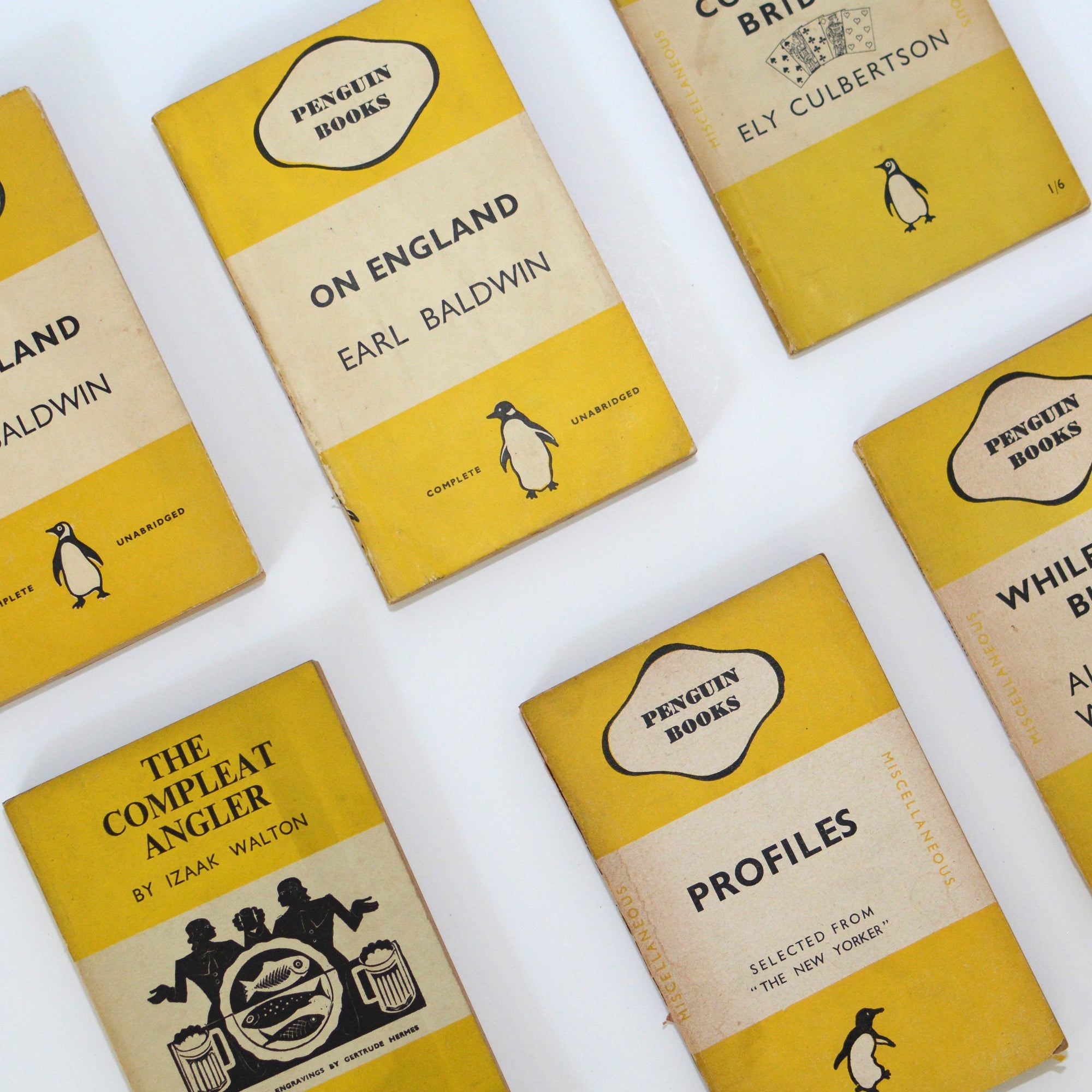 Four Book Collection of Yellow Vintage Penguins