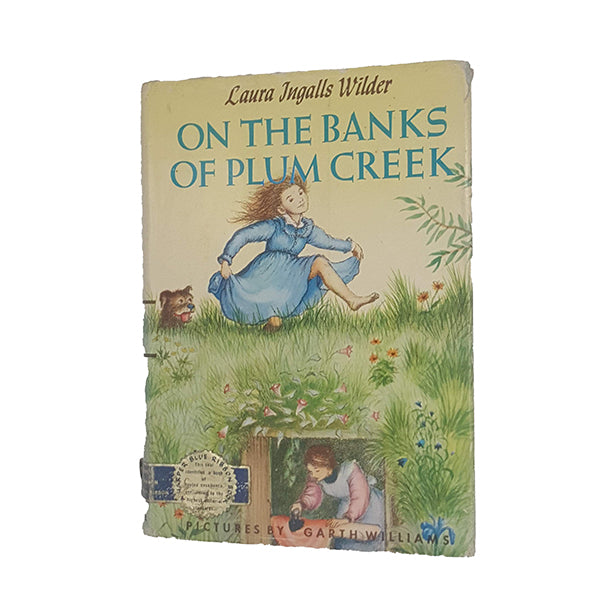 On The Banks of Plum Creek by Laura Ingalls Wilder - Harper, 1953