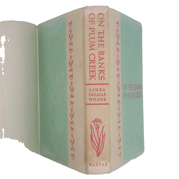 On The Banks of Plum Creek by Laura Ingalls Wilder - Harper, 1953