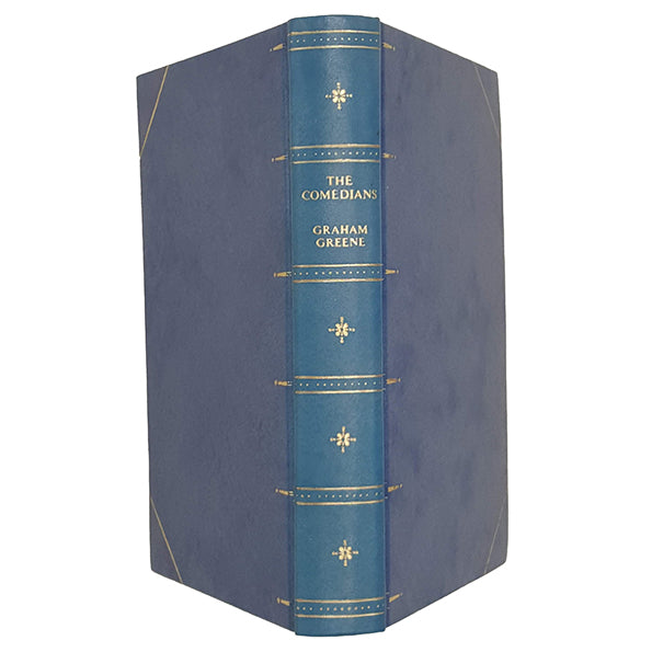 Graham Greene’s The Comedians - Companion Book Club, 1966 - light blue