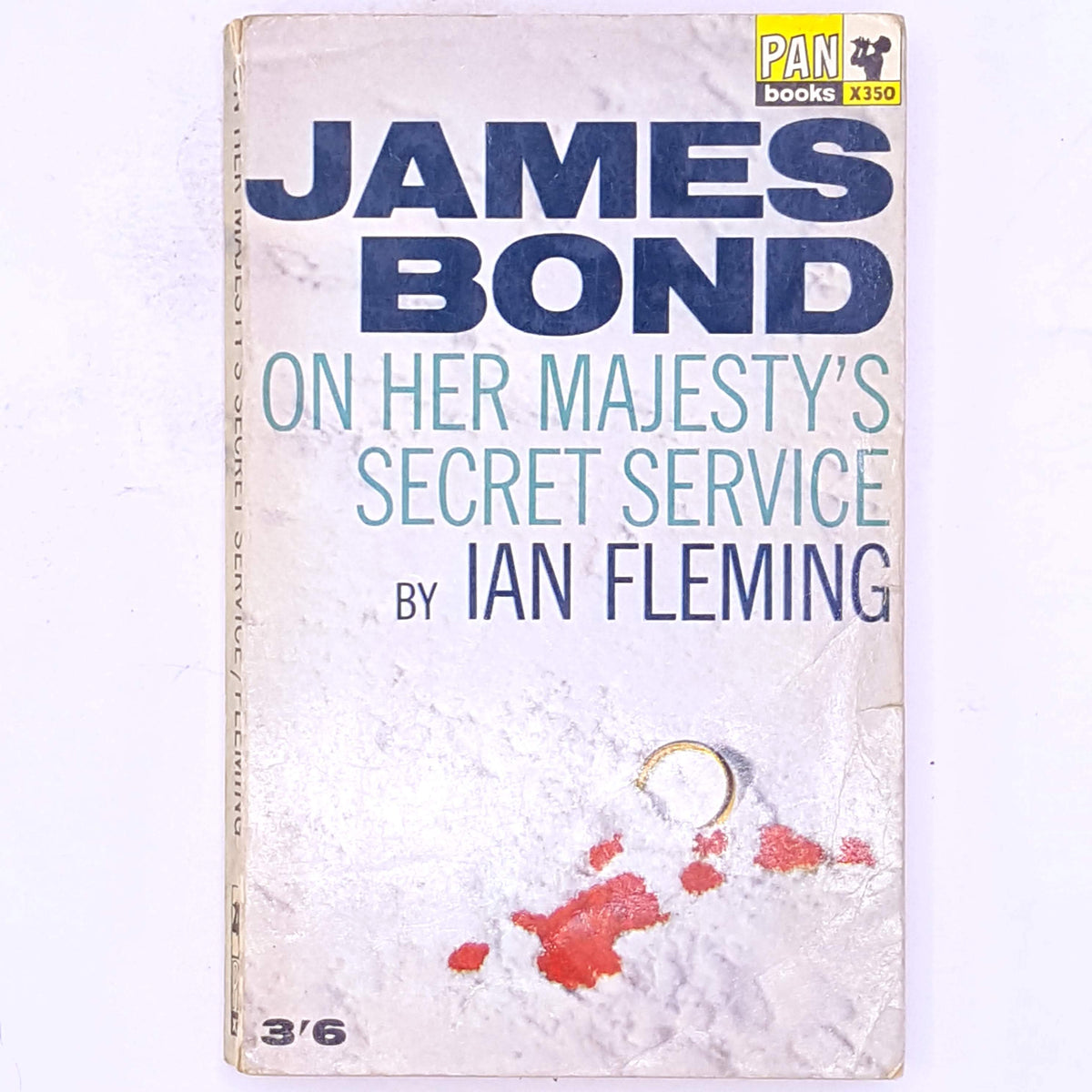 james-bond-spy-crime-mystery-British-secret-agent-antique-thrift-books-country-house-library-classic-old-thriller-secret-service-vintage-ian-fleming-on-her-majesty's-secret-service-decorative-patterned-007-