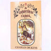 holidays-xmas-merry-christmas-present- patterned-christmas-thrift-vintage-classic-antique-christmas-gifts-december-noel-country-house-library-bright- charles-dickens-a-christmas-carol-penguin-festive-decorative-old-christmas-decoration-books-